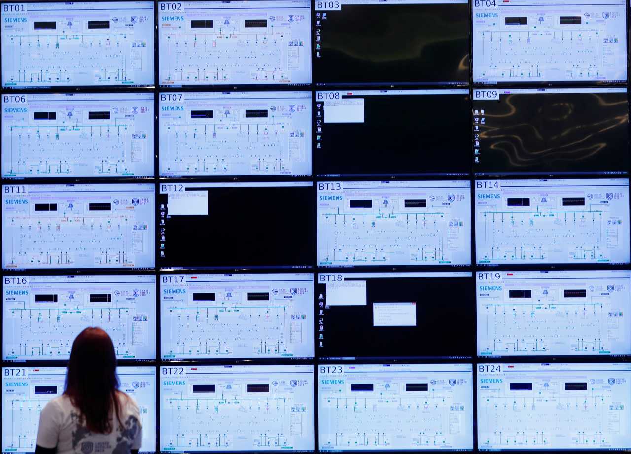 Photo: A woman looks at the screens during the Locked Shields, cyber defence exercise organized by NATO Cooperative Cyber Defence Centre of Exellence (CCDCOE) in Tallinn, Estonia April 10, 2019. Credit: REUTERS/Ints Kalnins