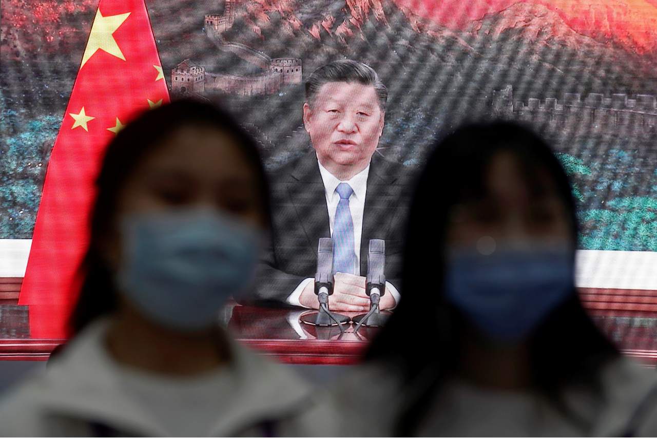 Photo: China's President Xi Jinping is seen on a screen in the media center as he speaks at the opening ceremony of the third China International Import Expo (CIIE) in Shanghai, China November 4, 2020. Credit: REUTERS/Aly Song