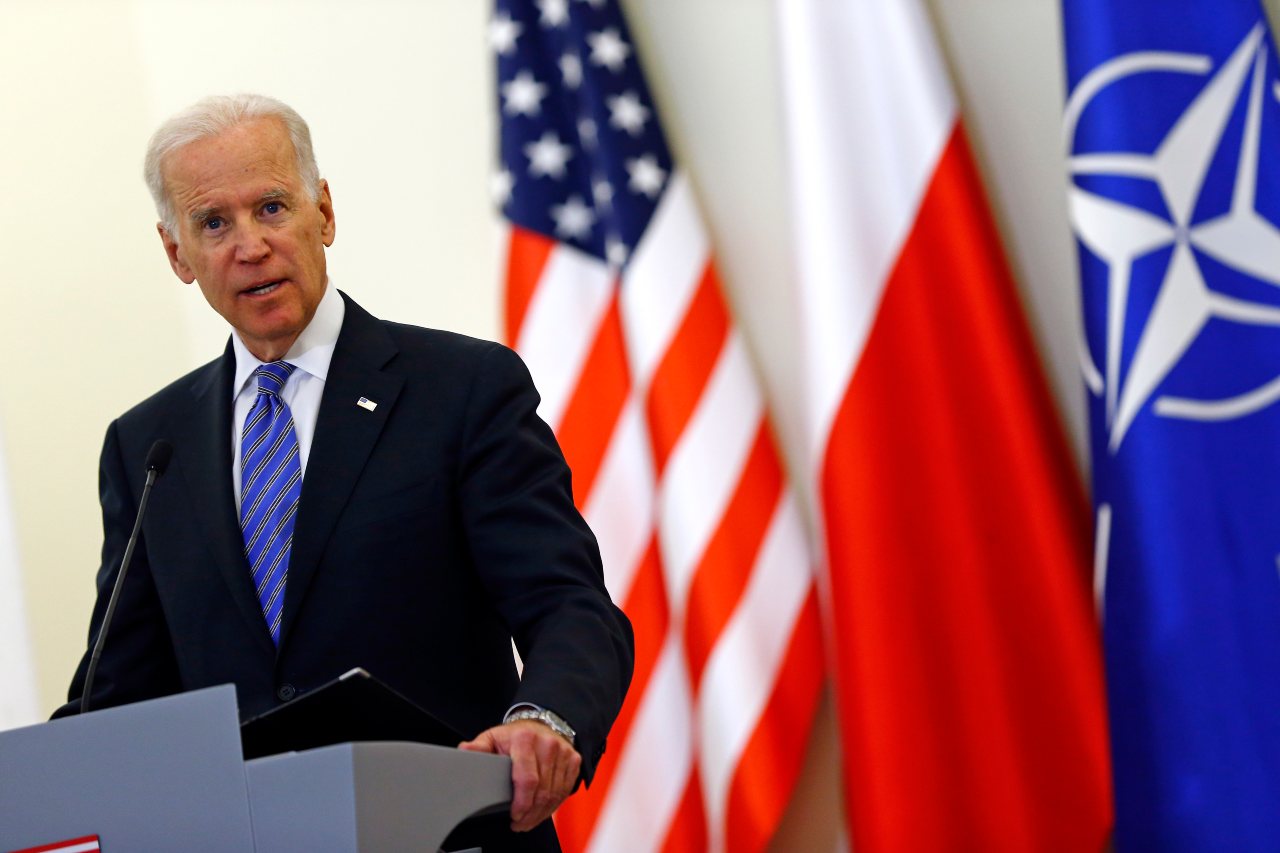 U.S. Vice President Joe Biden addresses to media after meeting Polish President Bronislaw Komorowski in Warsaw March 18, 2014. Biden told NATO allies in eastern Europe on Tuesday that the alliance was unwavering in its commitment to protect them from attack, offering reassurance after what he called Russia's "land grab" in Ukraine's Crimea REUTERS/Kacper Pempel