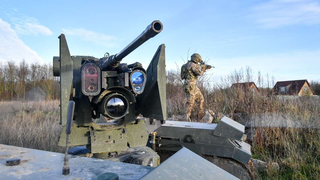 Photo: The barrel and sight equipment on top of a Titan Strike unmanned ground vehicle, equipped with a .50 Caliber machine gun, moves and secures ground on Salisbury Plain during exercise Autonomous Warrior 18, where military personnel, government departments and industry partners are taking part in Exercise Autonomous Warrior, working with NATO allies in a groundbreaking exercise to understand how the military can exploit technology in robotic and autonomous situations. Credit: PA Images via REUTERS