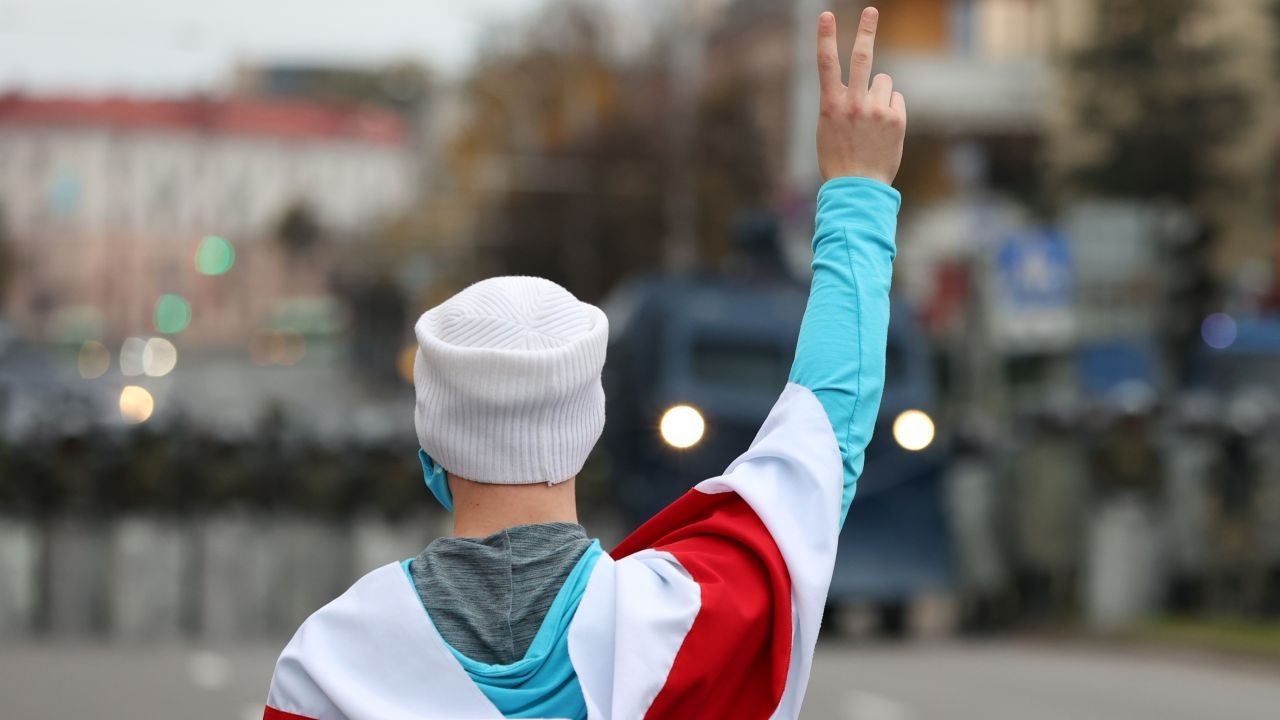 Photo: MINSK, BELARUS - OCTOBER 25, 2020: An opposition activist makes a V-sign during an unauthorized protest. Mass protests organized by the opposition have been taking place in Belarus after the 9 August presidential election. Credit: Stringer/TASS.
