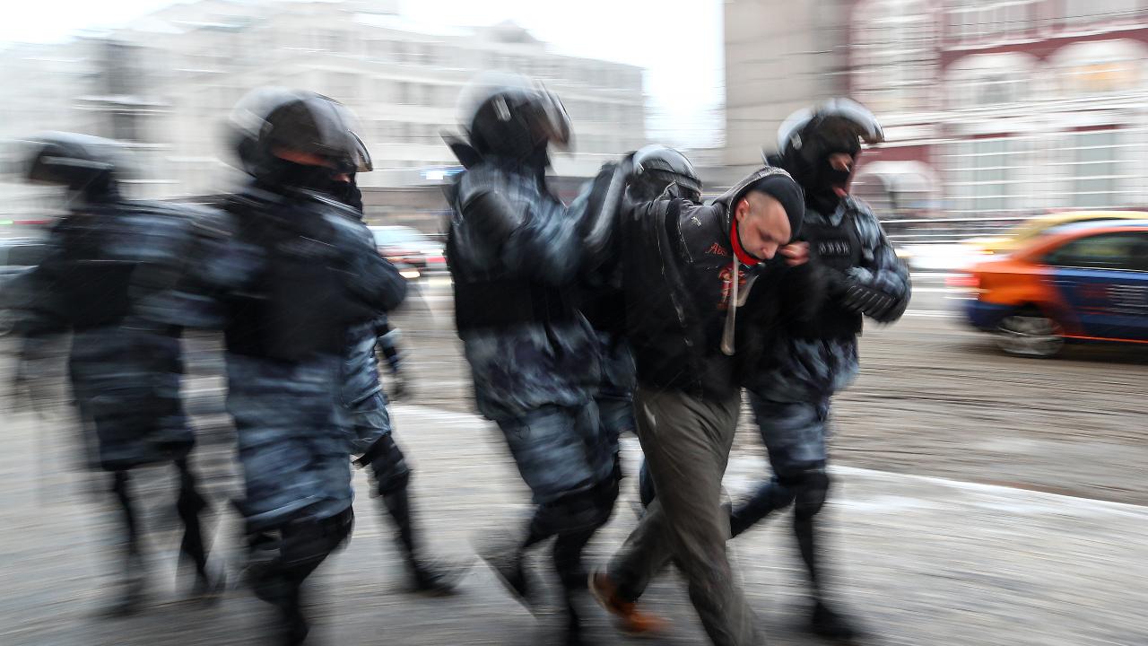 Photo: Riot police officers detain a participant in an unauthorized rally in support of Russian opposition activist Alexei Navalny in Komsomolskaya Square. In connection with calls for protests, pedestrian movement and public transport have been restricted in central Moscow. Access to several stations of the Moscow Metro has been temporarily closed, with trains passing without stopping. Credit: Valery Sharifulin/TASS via Reuters