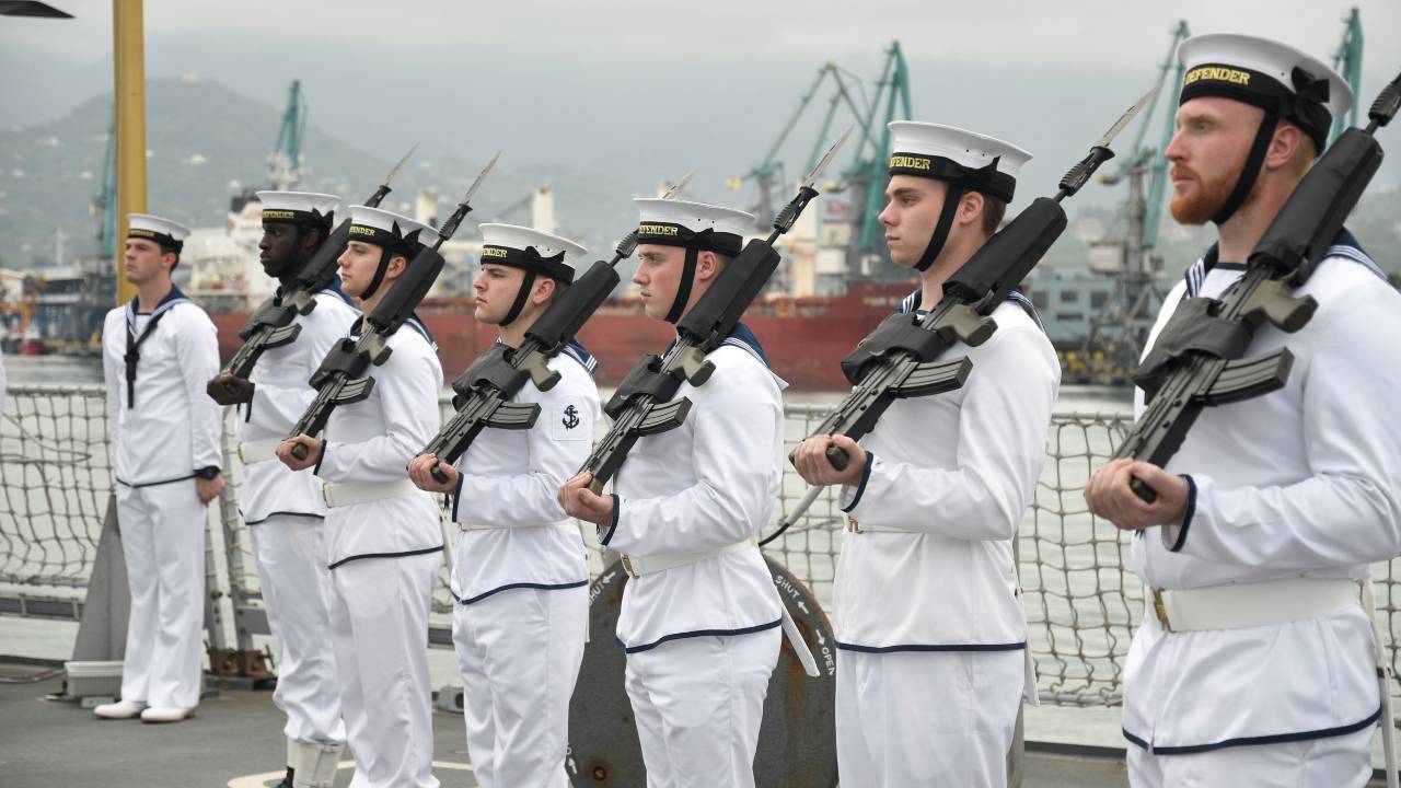 Photo: British Royal Navy members line up onboard the warship HMS Defender in the Black Sea port of Batumi, Georgia, June 26, 2021. Credit: Vasil Gedenidze/British Embassy in Georgia/Handout via REUTERS
