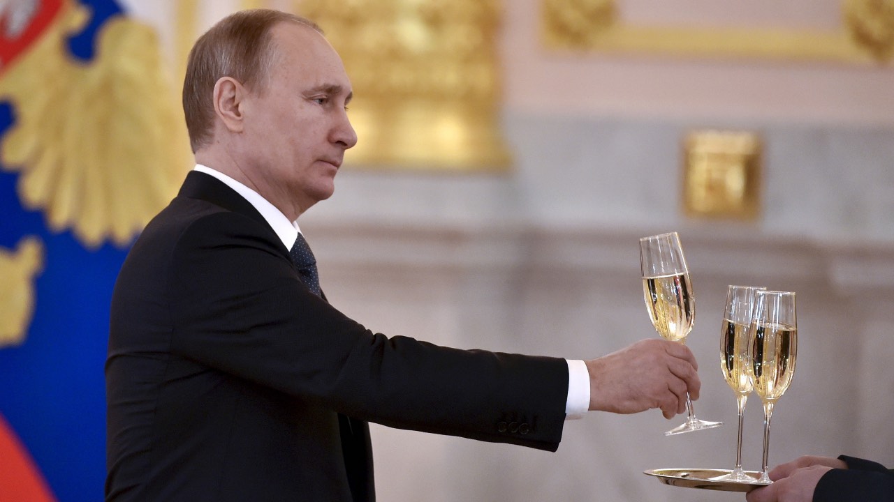 Photo: Russia's President Vladimir Putin holds a glass as he attends a ceremony to receive credentials from foreign ambassadors at the Kremlin in Moscow, Russia, April 20, 2016. Credit: REUTERS/Kirill Kudryavtsev/Pool/File Photo