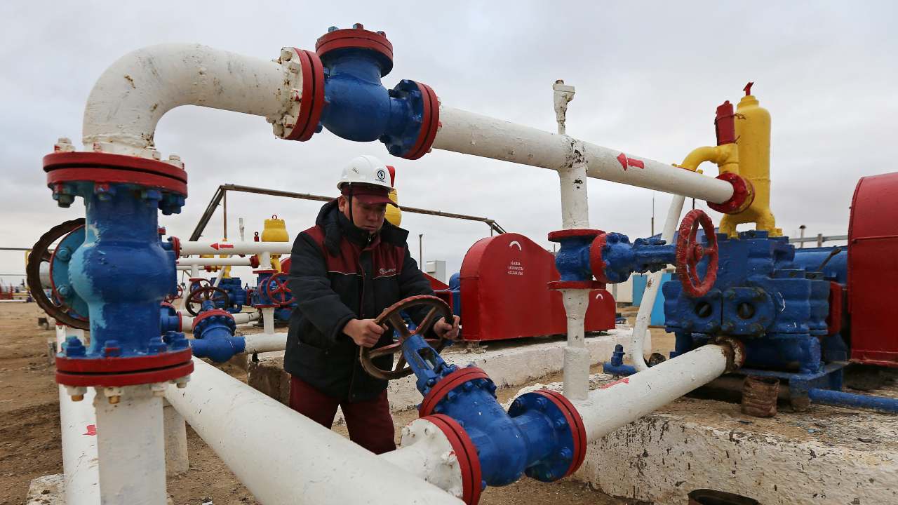 Photo: A worker checks the pressure of pumps at an oil-pumping station in the Uzen oil and gas field in the Mangistau Region of Kazakhstan November 13, 2021. Credit: REUTERS/Pavel Mikheyev