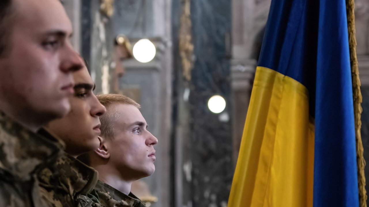 Photo: Ukrainian soldiers mourn for their comrades during the military funeral. The military funeral of Ukrainian soldiers killed in airstrike bombing in Yavoriv, Western part of Ukraine near the border to Poland, has been held in Saints Peter and Paul Garrison Church, Lviv. Credit: Alex Chan Tsz Yuk / SOPA Images/Sipa USA