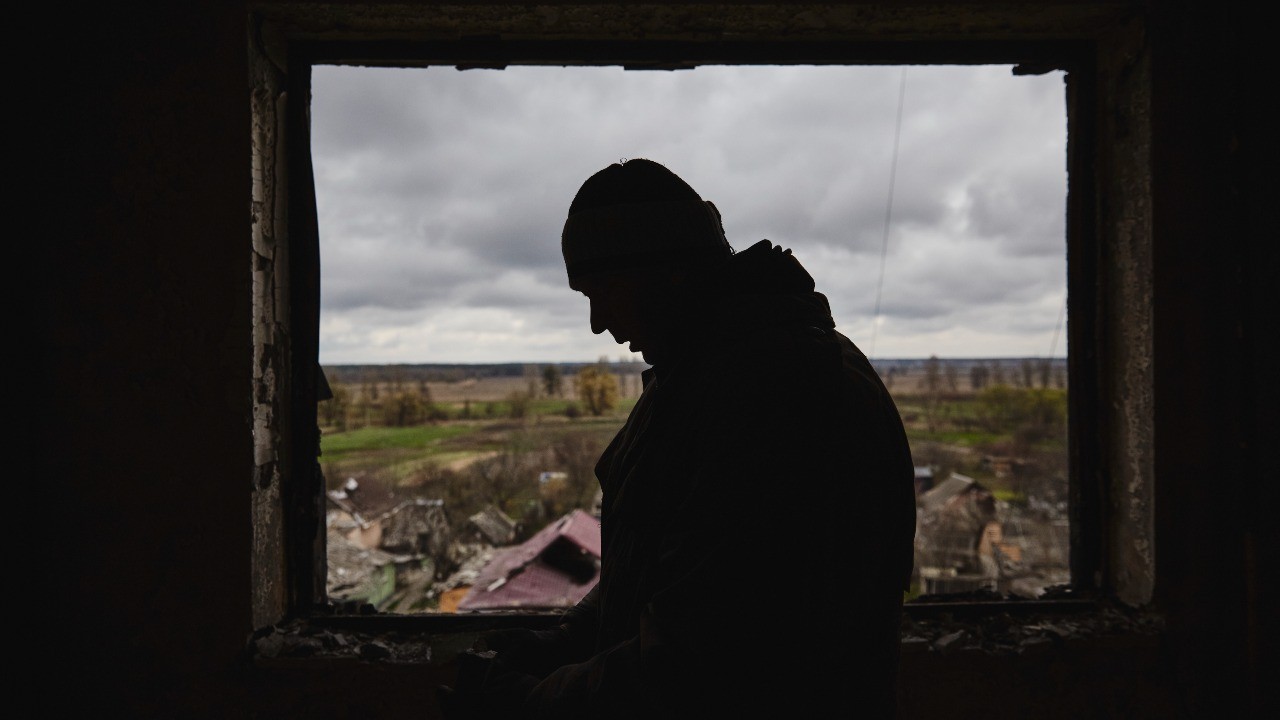 Photo: A man inspects his apartment, which was damaged by fire due to the shelling of Borodyanka, Kyiv region. Credit: Photo by Oleg Pereverzev/NurPhoto.