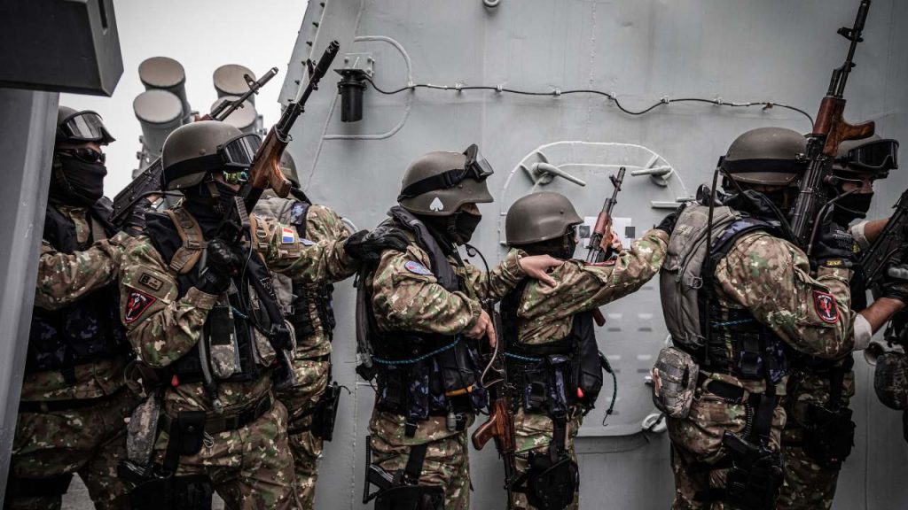 Photo: Romanian Special Operations Forces execute a simulated boarding operation aboard the Canadian frigate HMCS Toronto during Exercise Sea Breeze 2019. Credit: NATO