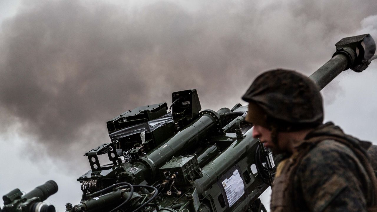 Photo: A US Marine M777 howitzer smokes following a fire mission during Exercise Dynamic Front 2019 at Adazi Training Grounds in Latvia. The exercise lets NATO Allies practice receiving and executing artillery fire missions in unison. Credit: NATO
