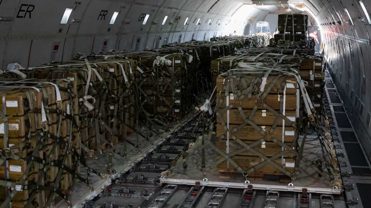 Photo: Pallets of ammunition bound for Ukraine are secured onto a commercial plane during a security assistance mission at Dover Air Force Base, Delaware, July 21, 2022. The Department of Defense is providing Ukraine with critical capabilities to defend against Russian aggression under the Ukraine Security Assistance initiative. Credit: U.S. Air Force photo by Senior Airman Faith Schaefer via dvids.