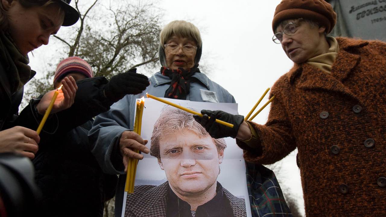 Photo: People light candles during a gathering commemorating the death of former Russian state security officer Alexander Litvinenko in central Moscow November 22, 2008. The former Russian agent Litvinenko died on November 23, 2006 after he was poisoned with highly radioactive Polonium 210. Credit: REUTERS/Thomas Peter