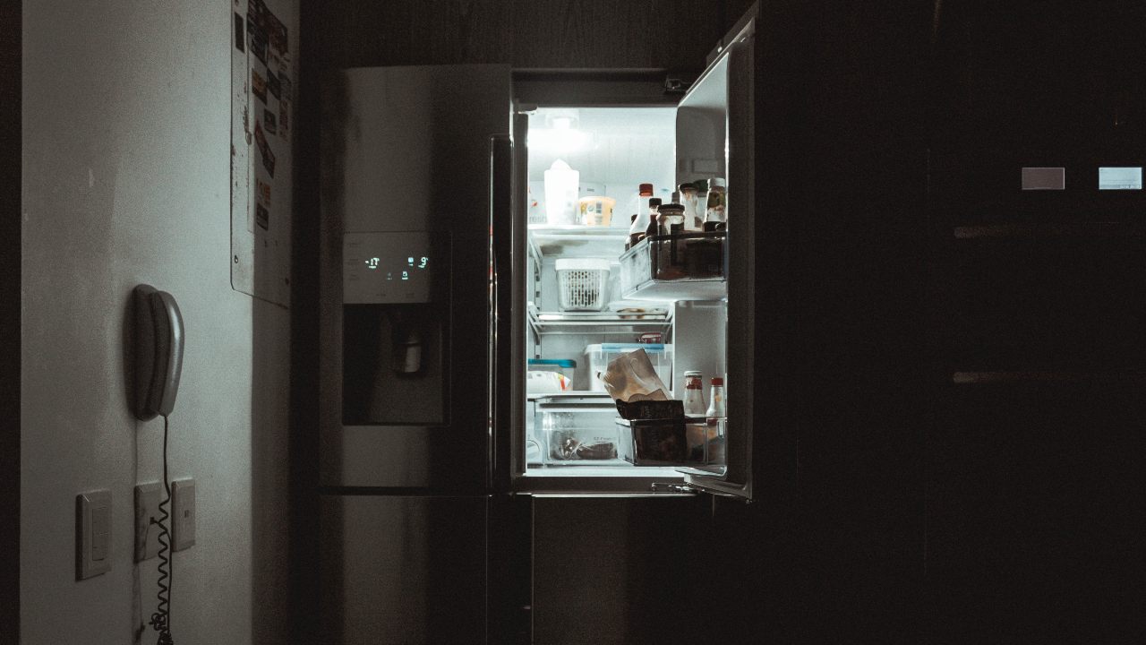Photo: Refrigerator with open door. Credit: @nicotitto via Unsplash.