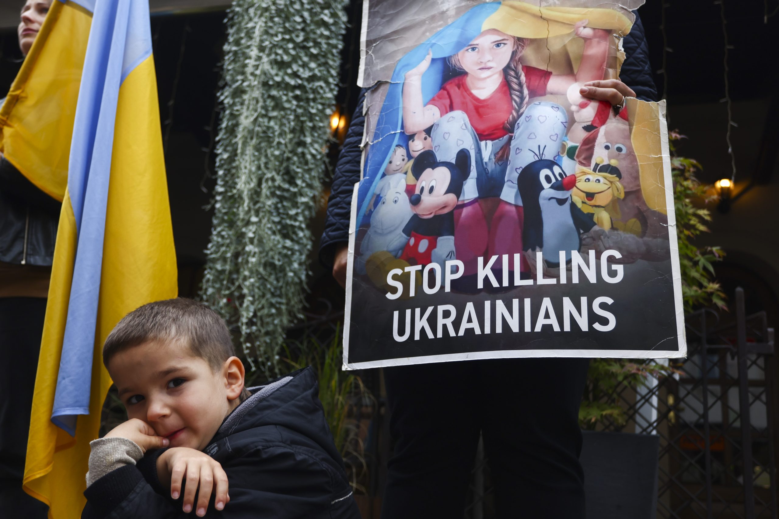 Photo: An Ukrainian boy attends a demonstration of solidarity with Ukraine in Krakow, Poland on October 1st, 2022. Credit: Beata Zawrzel/NurPhoto