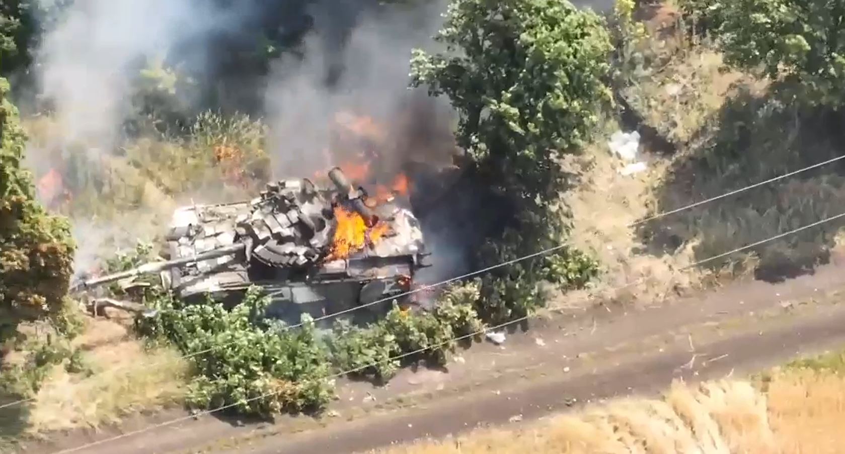 Photo: Russian T-80BV tank on fire. Credit: OTU "Pivnich", Military unit of the Armed Forces of Ukraine via Facebook. https://www.facebook.com/watch/?v=463092205554584
