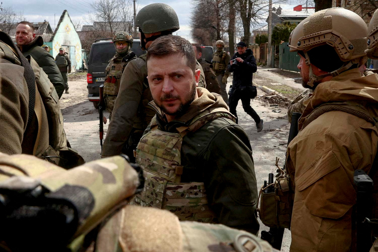 Photo: Ukraine's President Volodymyr Zelenskyy looks on as he is surrounded by Ukrainian servicemen as Russia's invasion of Ukraine continues, in Bucha, outside Kyiv, Ukraine, April 4, 2022. Credit: REUTERS/Marko Djurica