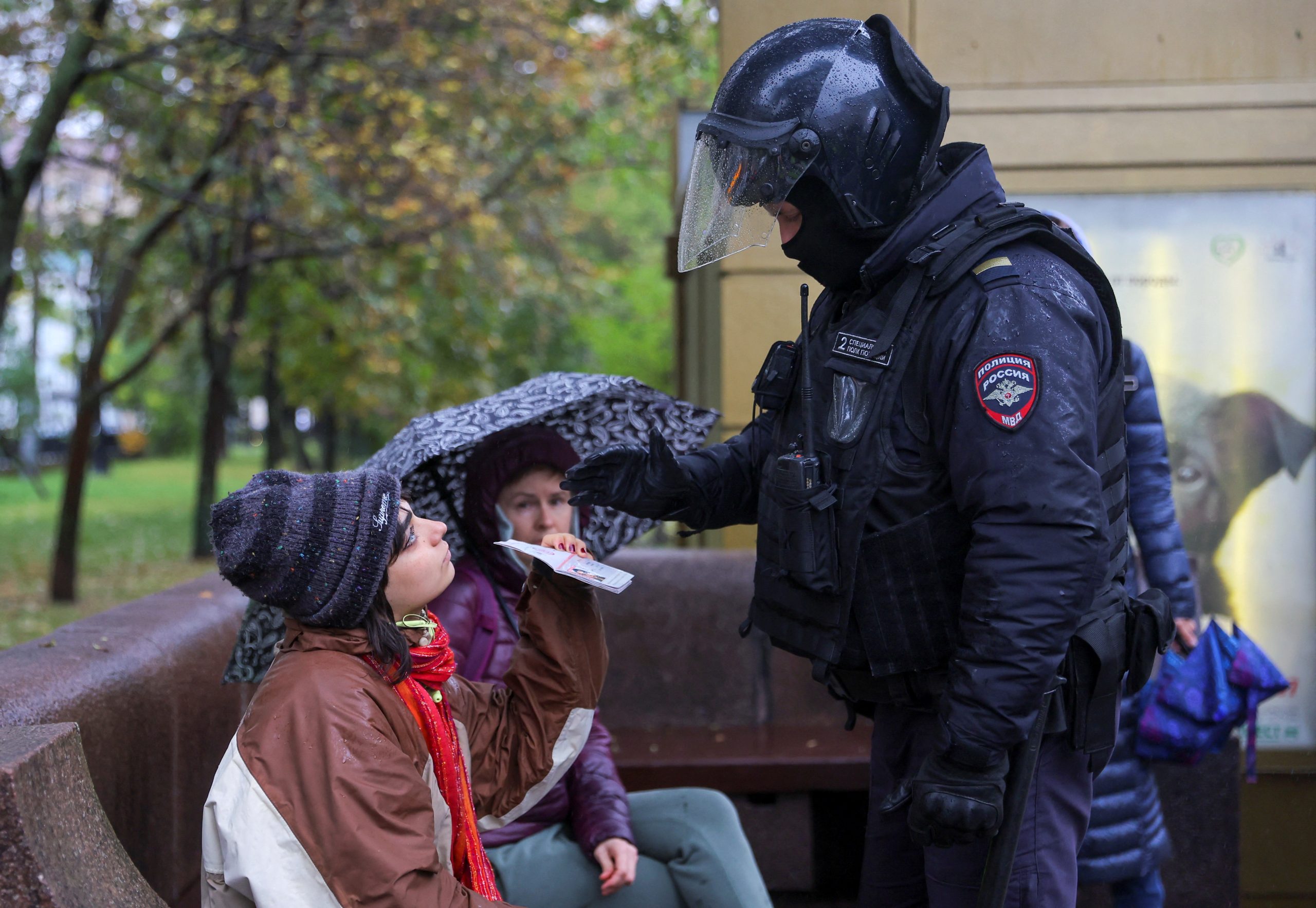 Photo: A person shows a passport to a Russian law enforcement officer during a rally, after opposition activists called for street protests against the mobilisation of reservists ordered by President Vladimir Putin, in Moscow, Russia September 24, 2022. Credit: REUTERS/REUTERS PHOTOGRAPHER