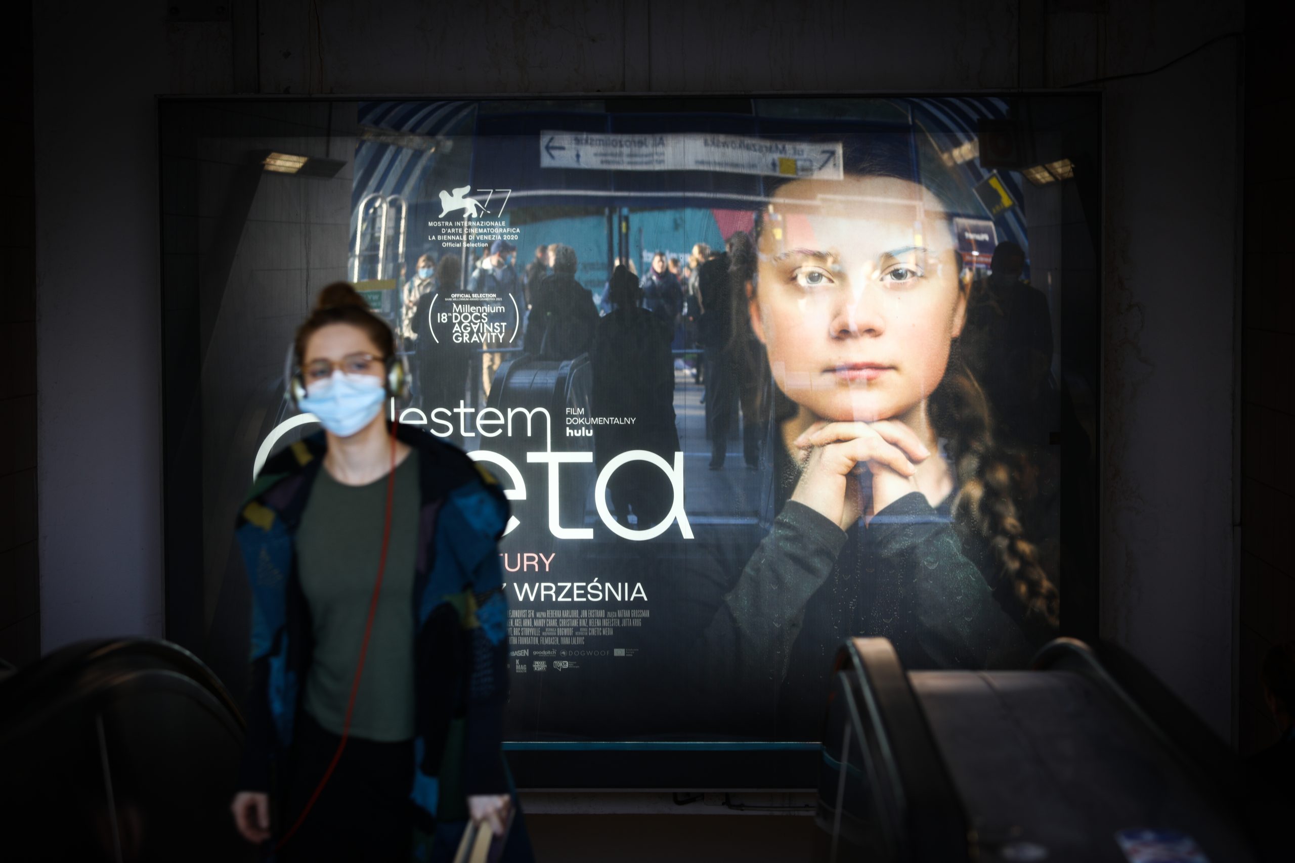 Photo: An advertisement for a new documentary on climate activist Greta Thunberg is seen at the Metro Centrum subway station in Warsaw, Poland on 01 October, 2021. Credit: STR/NurPhoto