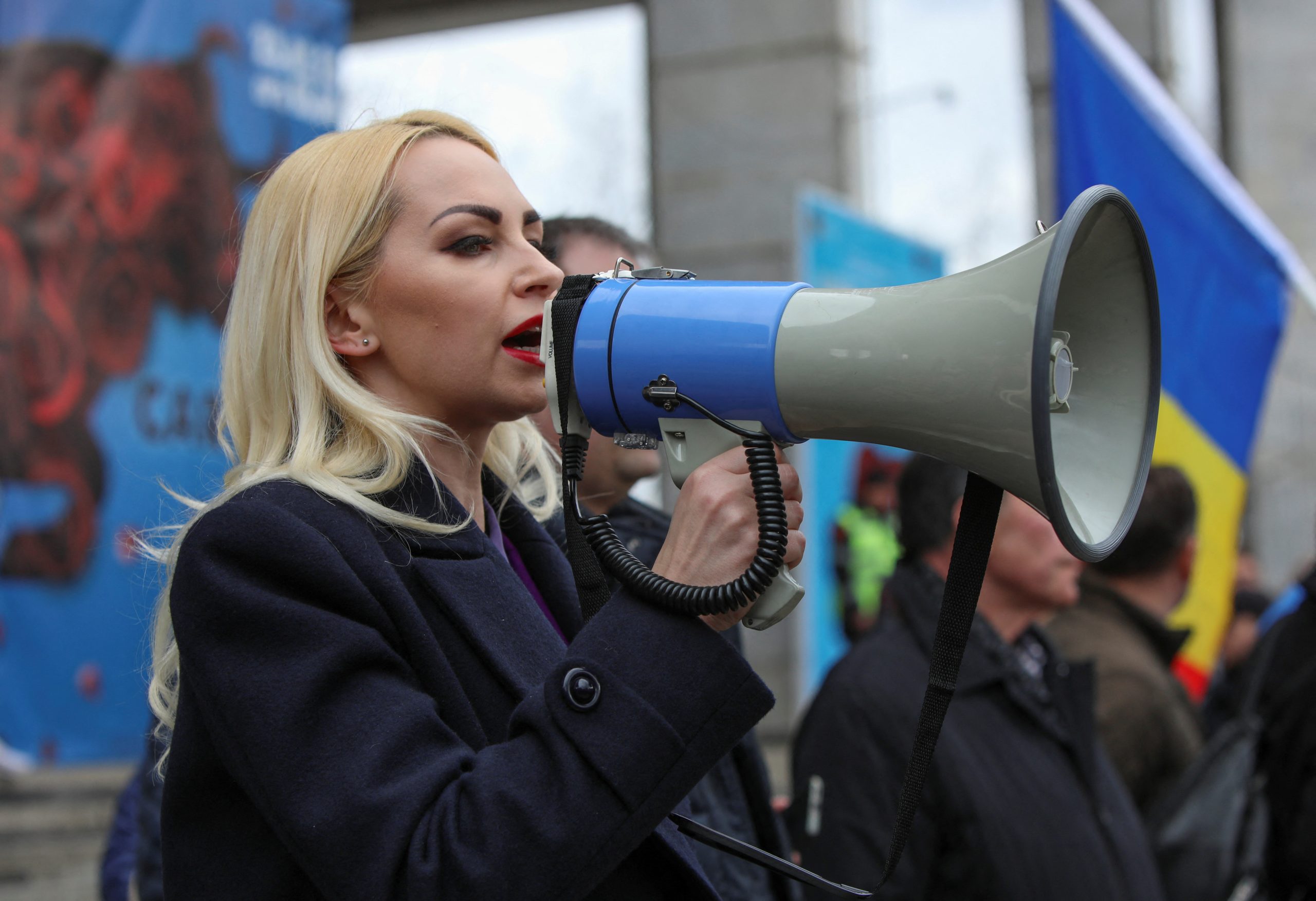 Photo: Marina Tauber, a member of the political party Shor, addresses supporters during an opposition rally to protest against the recent countrywide increase of power rates and prices in Chisinau, Moldova, February 19, 2023. Credit: REUTERS/Vladislav Culiomza