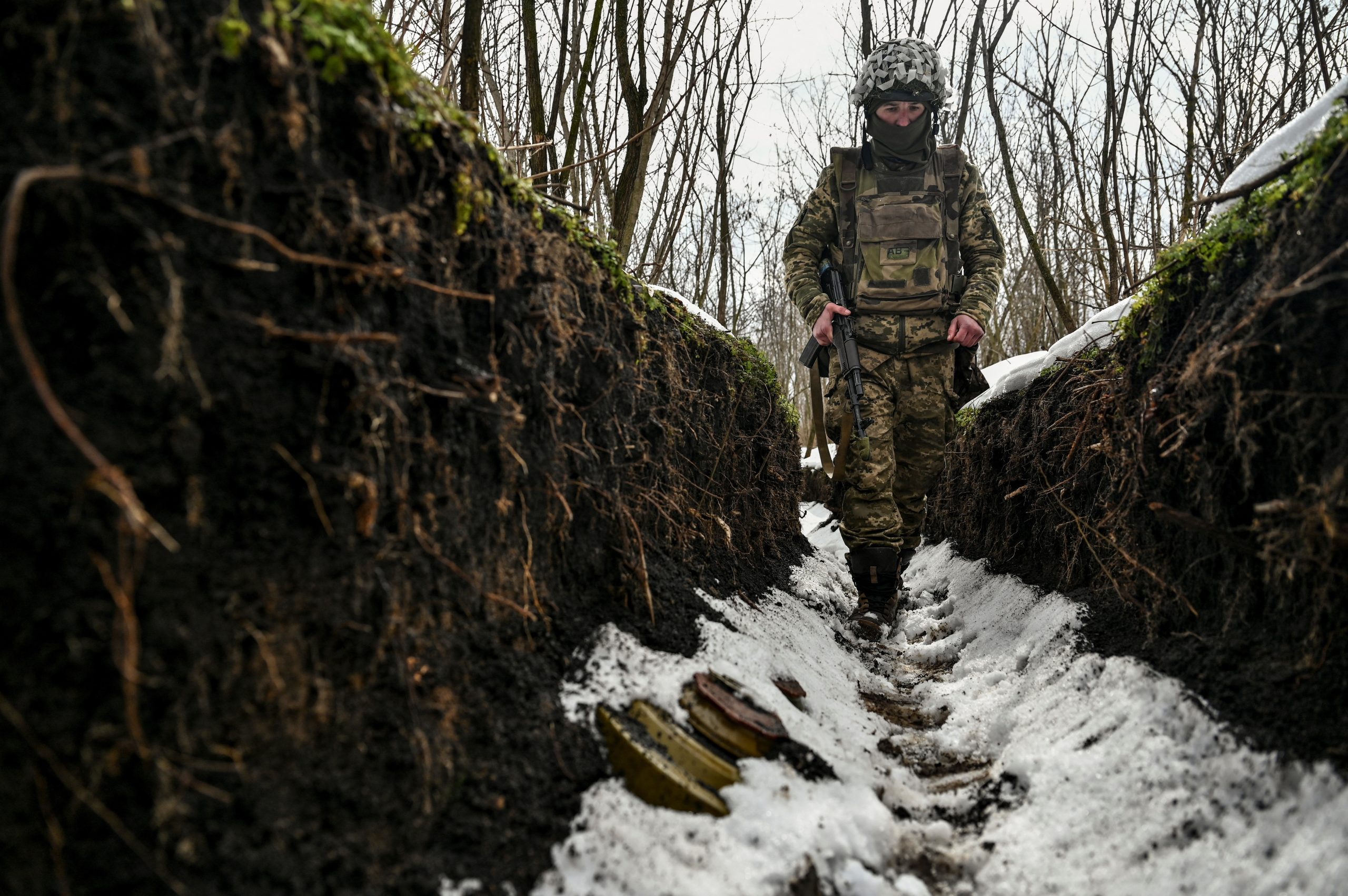 Photo: A Ukrainian serviceman walks inside a trench at a position near a frontline, amid Russia's attack on Ukraine, in Zaporizhzhia region, Ukraine February 19, 2023. Credit: REUTERS/Stringer